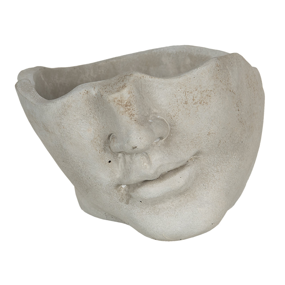 face-shaped vase