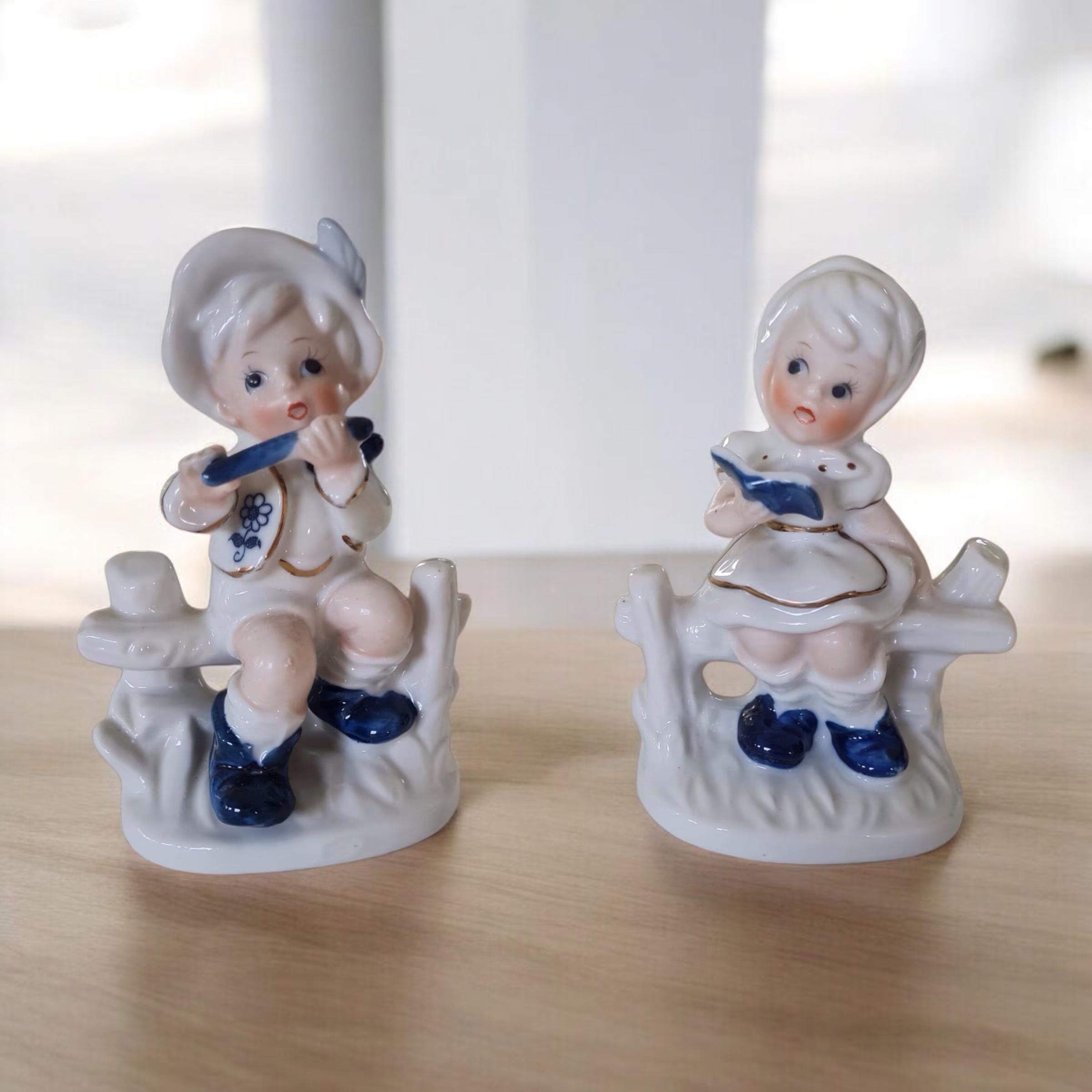 Statuette vintage in porcellana italiana bambino e una bambina.